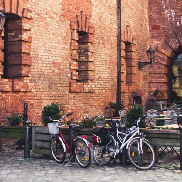 Parked bikes near outdoor cafe in Europe