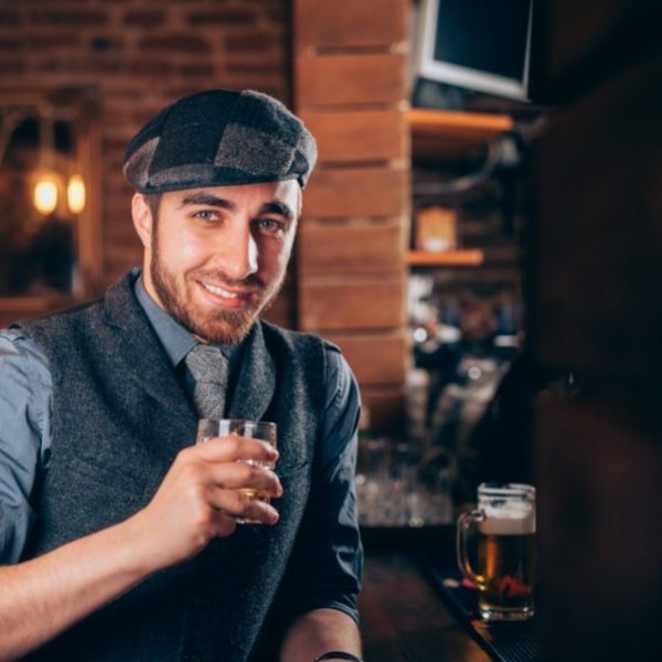 single fashion man, bachelor enjoying drinks at bar counter